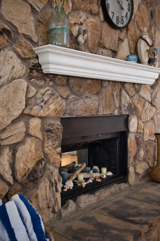 room details with a stone fireplace