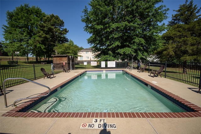 view of pool with a patio