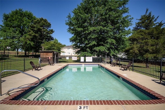 view of pool with a patio