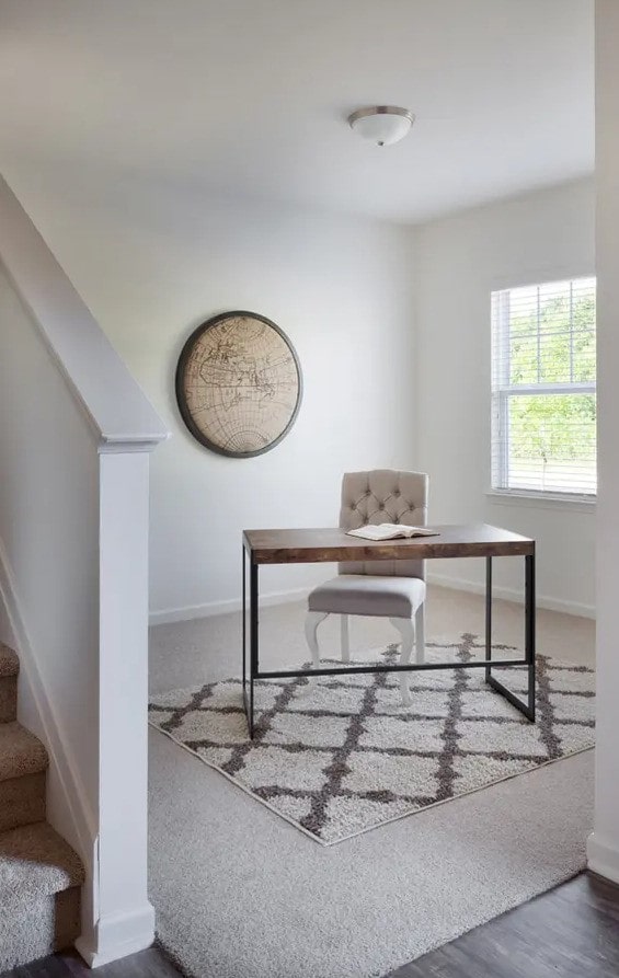 office space with dark wood-type flooring