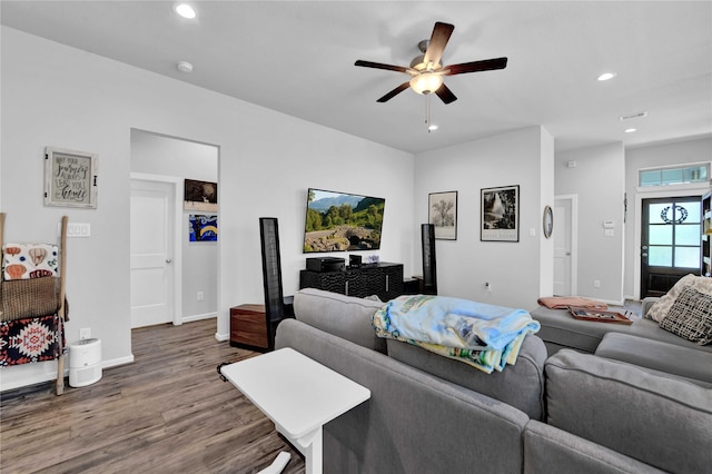 living room with hardwood / wood-style floors and ceiling fan