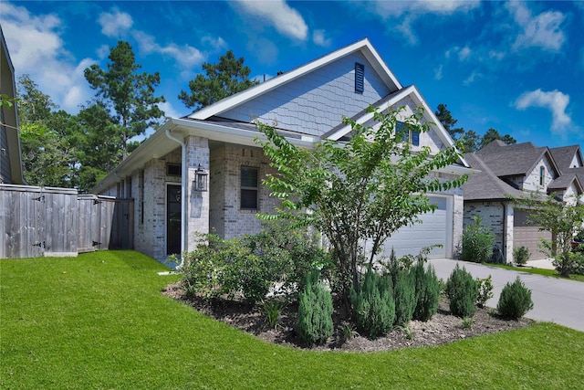 view of side of home with a yard and a garage