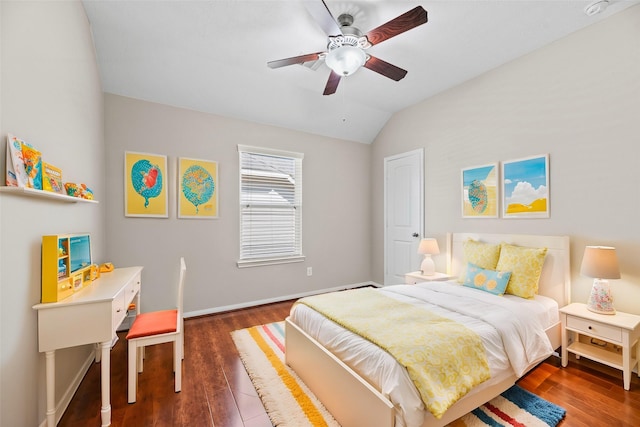 bedroom featuring lofted ceiling, dark wood-type flooring, and ceiling fan