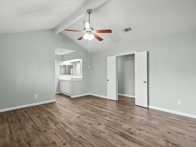 unfurnished living room featuring hardwood / wood-style flooring, vaulted ceiling with beams, and ceiling fan