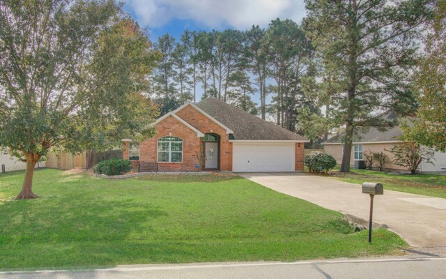 view of front facade featuring a front lawn and a garage