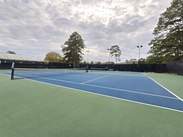 view of sport court featuring basketball court