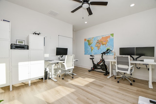 office with ceiling fan and light hardwood / wood-style floors