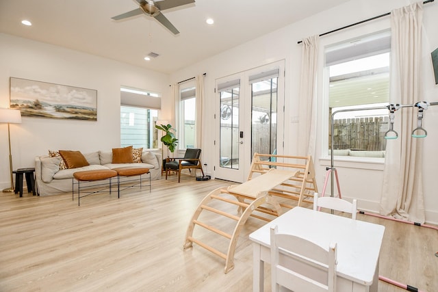 interior space featuring ceiling fan, light hardwood / wood-style flooring, and french doors