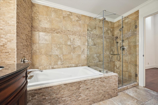 bathroom featuring ornamental molding and shower with separate bathtub