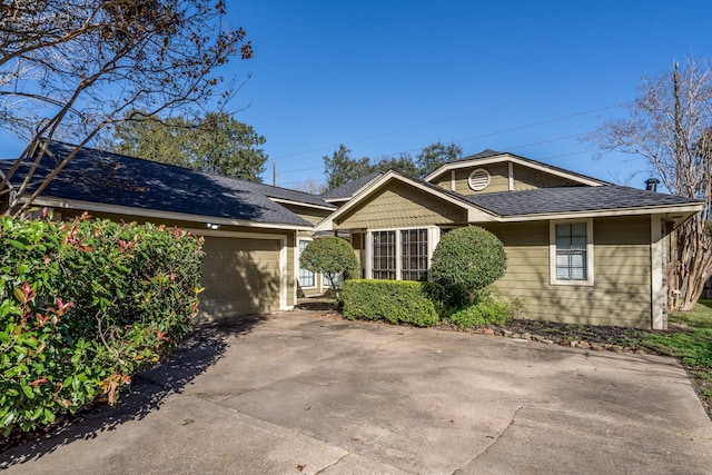 ranch-style house with a garage