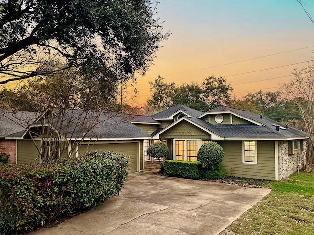 view of front of property with a garage