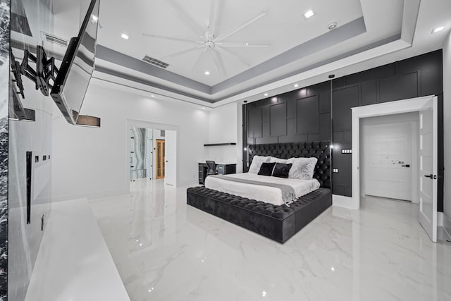 bedroom with a raised ceiling