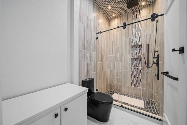 bathroom with an enclosed shower and toilet