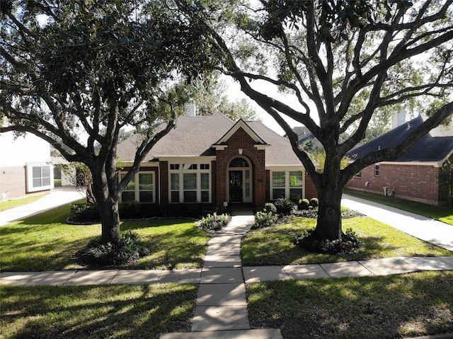 view of front of house with a front yard