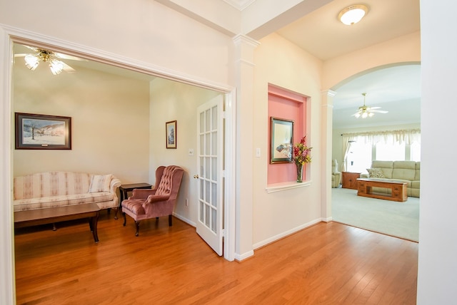 hall with light hardwood / wood-style floors