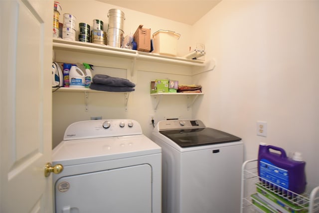 laundry area with washer and clothes dryer