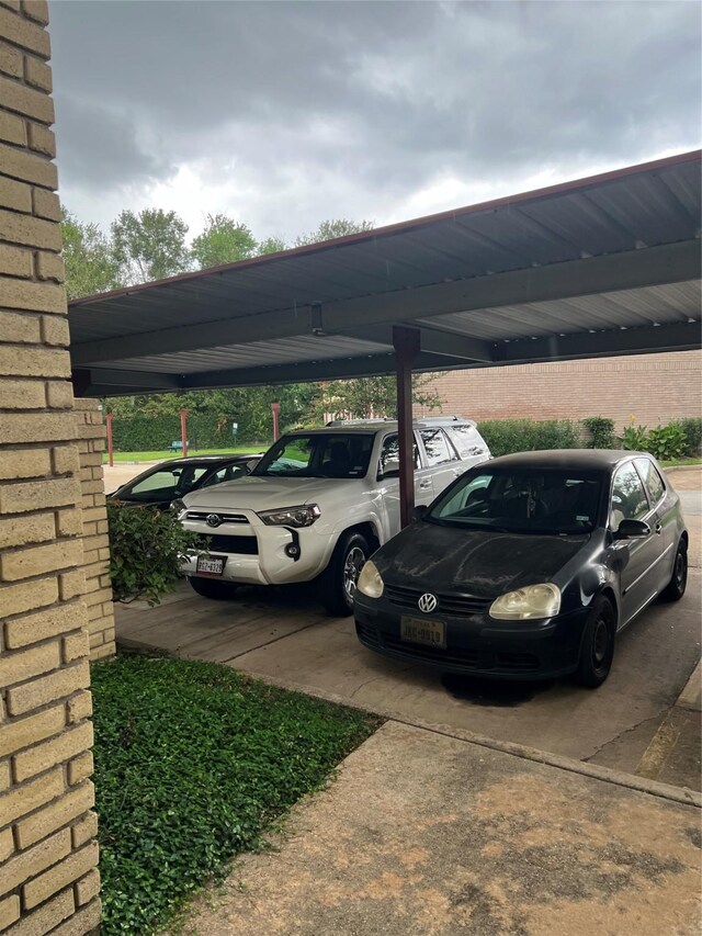 view of parking with a carport