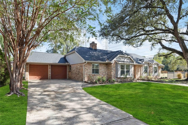 ranch-style house featuring a garage and a front lawn