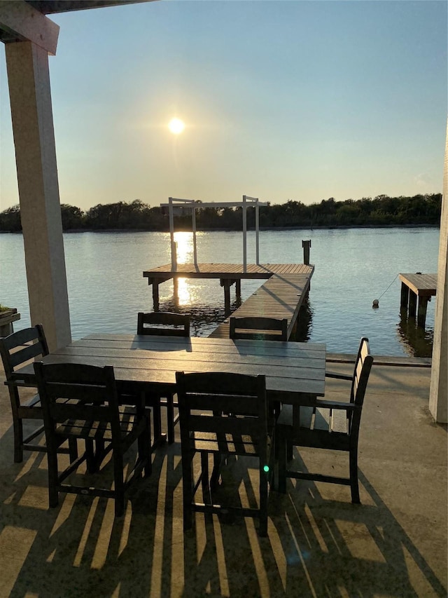 dock area with a water view