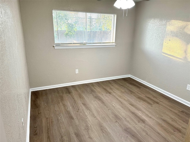 empty room featuring hardwood / wood-style floors