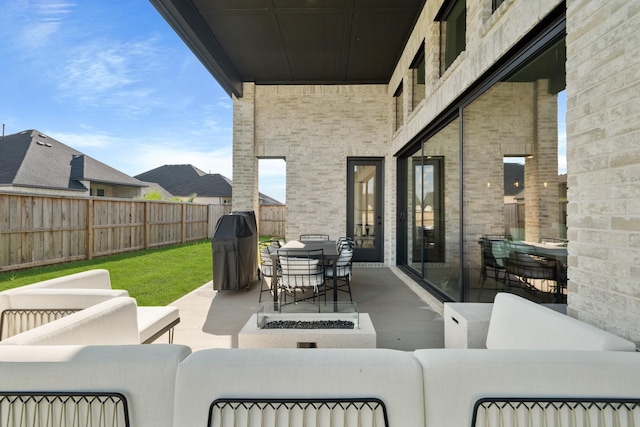 view of patio / terrace featuring grilling area and an outdoor hangout area