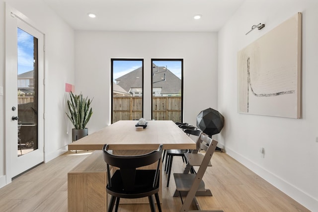 dining room featuring light hardwood / wood-style floors