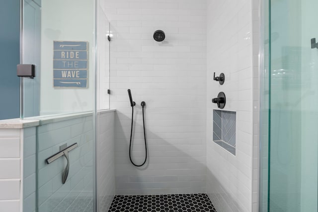 bathroom featuring walk in shower