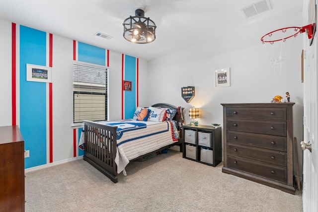 bedroom with light carpet