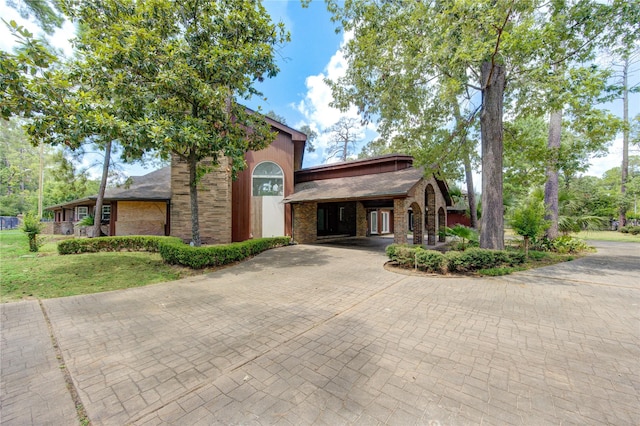 view of front of property with a carport