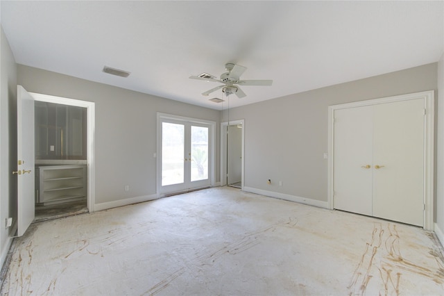 unfurnished bedroom featuring french doors, connected bathroom, and ceiling fan