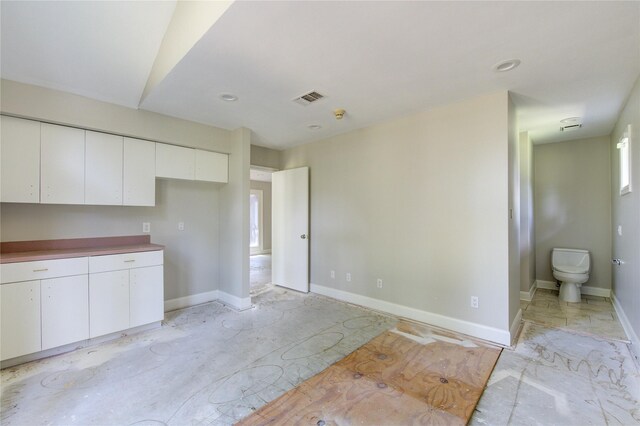 kitchen with white cabinetry