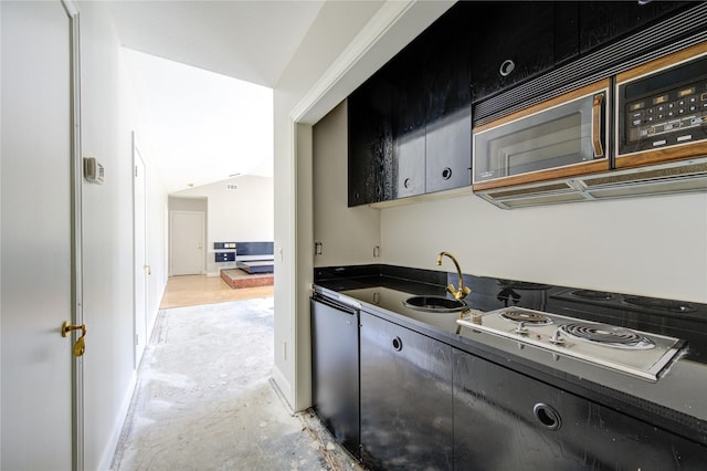 kitchen with stovetop and sink