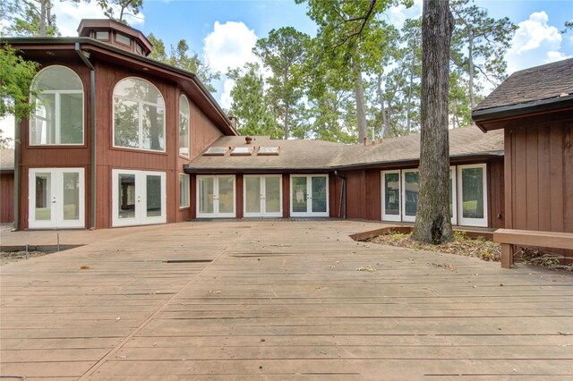 wooden terrace featuring french doors