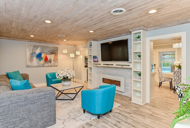 living room with built in shelves, a fireplace, wooden ceiling, and light hardwood / wood-style floors