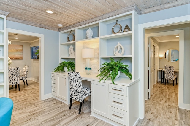 office area featuring light hardwood / wood-style floors, built in desk, ornamental molding, and wooden ceiling