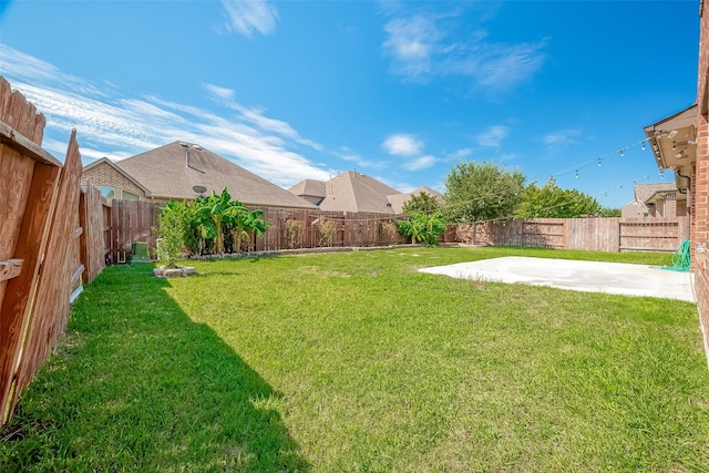 view of yard with a patio area