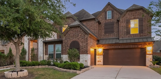 tudor home featuring a garage