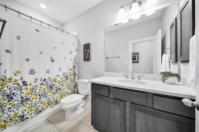 full bathroom with tile patterned flooring, vanity, shower / bath combination with curtain, and toilet