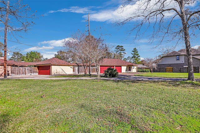 view of yard featuring a garage