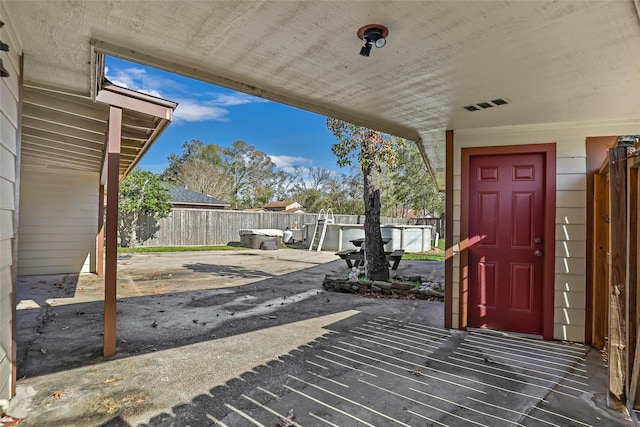 view of patio with a pool