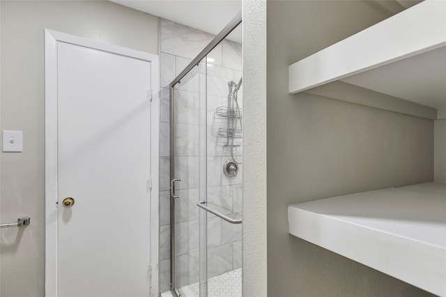 bathroom with an enclosed shower