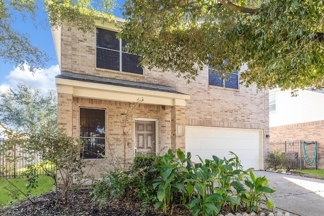 view of front of home with a garage