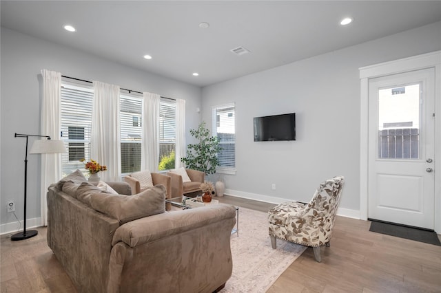 living room with light wood-type flooring