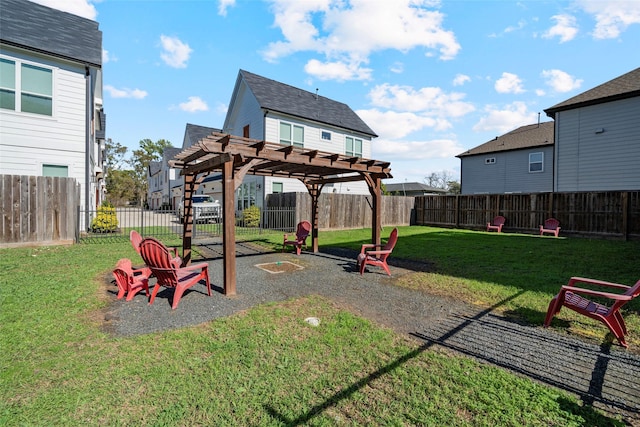 view of play area with a yard and a pergola