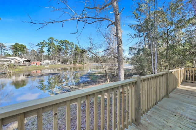 wooden terrace with a water view