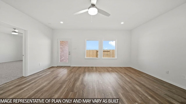 14611 Lost Cave Way, New Caney, TX 77357 - spare room with ceiling fan, wood finished floors, and recessed lighting