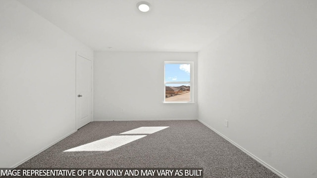 empty room featuring carpet flooring