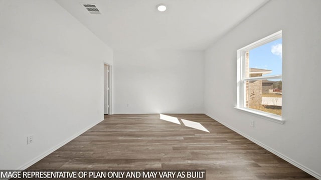 14611 Lost Cave Way, New Caney, TX 77357 - spare room with wood finished floors