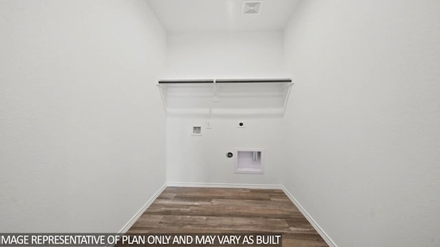 14611 Lost Cave Way, New Caney, TX 77357 - washroom with hookup for a gas dryer, electric dryer hookup, washer hookup, and wood finished floors