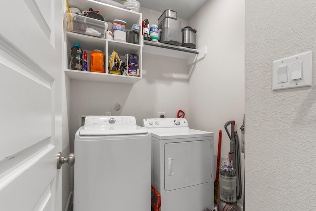 washroom with washing machine and dryer